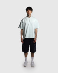 T-shirt oversize Noclout vert menthe porté homme vue de face streetwear